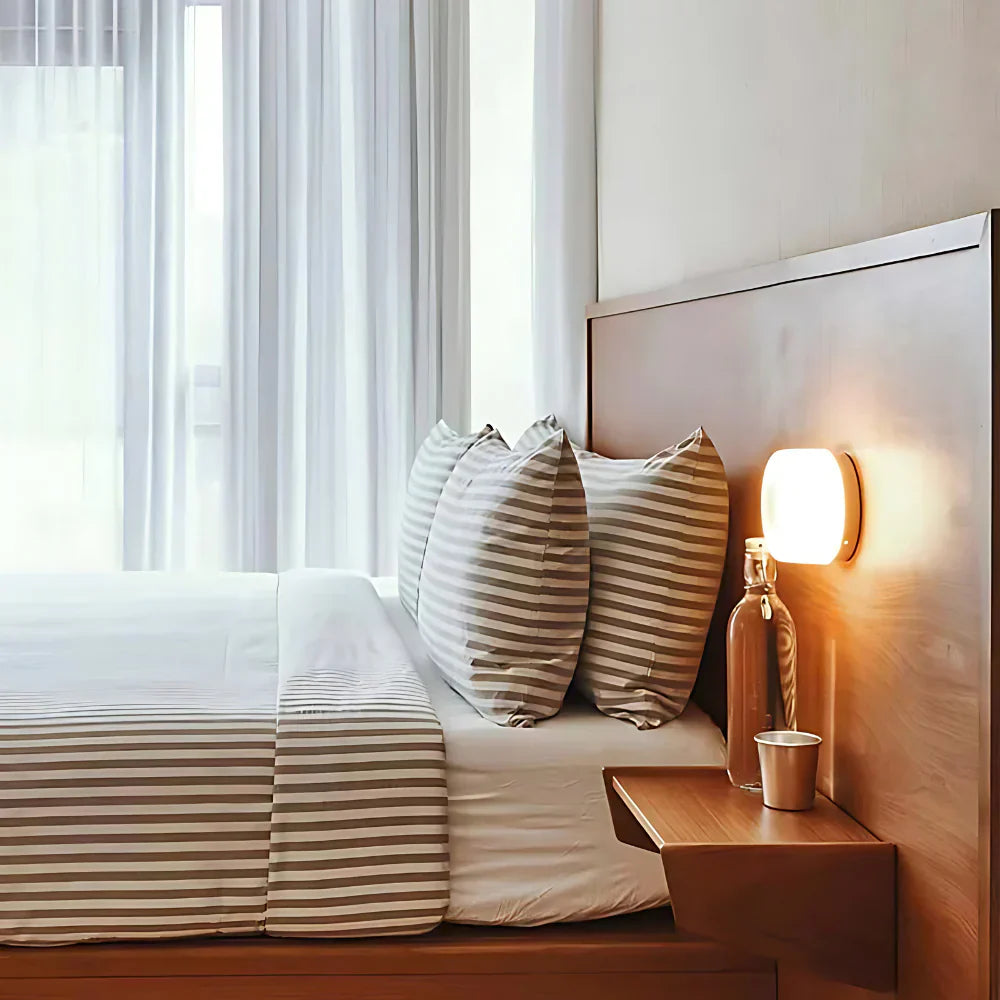 Nordic Acrylic Wall Sconce with Round Ambient Glow